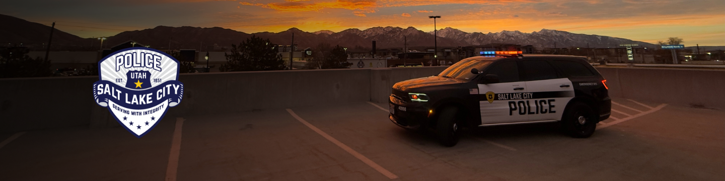 Salt Lake City Police Department logo overlaying an image of a SLCPD patrol vehicle.