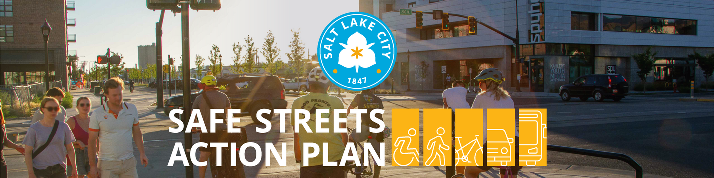 Background: Photo of pedestrians and bicyclists crossing the intersection of 900 South and 200 West in Salt Lake City. Foreground: Graphic includes a logo, consisting of a blue circle with a white and yellow Sego Lily and white text, “Salt Lake City” and “1847;” additional white text, “Safe Streets Action Plan;” and five yellow rectangles with white outlined icons, consisting of a person in a wheelchair, pedestrian, bicycle, car, and bus.