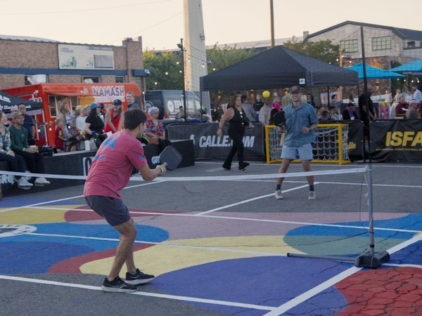 People playing pickleball in the Granary District.