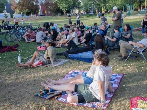 Park visitors enjoying a concert at Jefferson Park